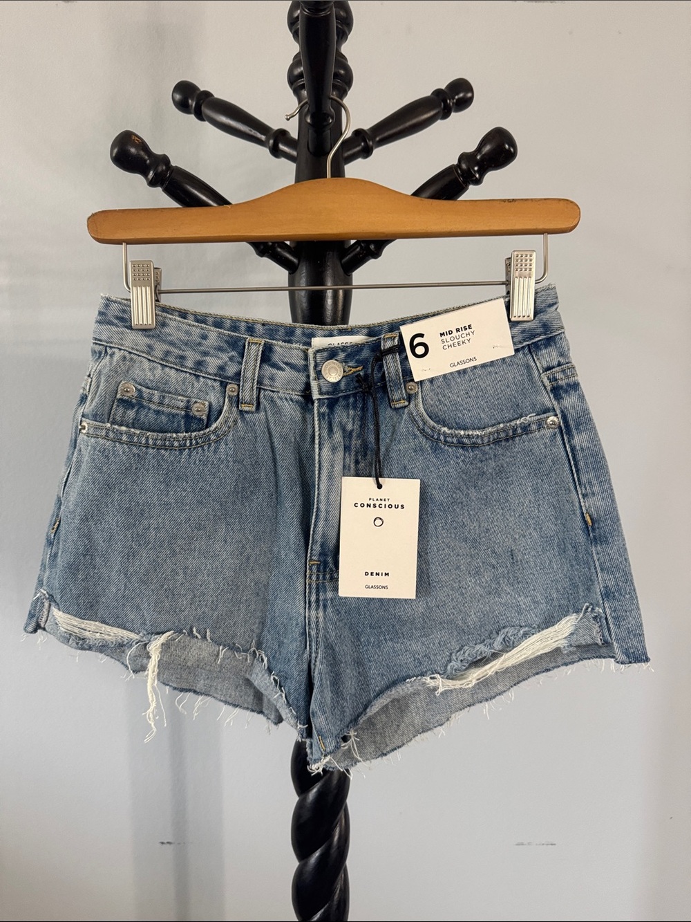 High-Rise Distressed Denim Shorts — Light Blue